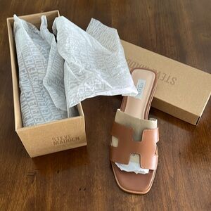 New and never worn slides